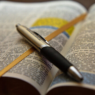 Open-Bible-with-Pen